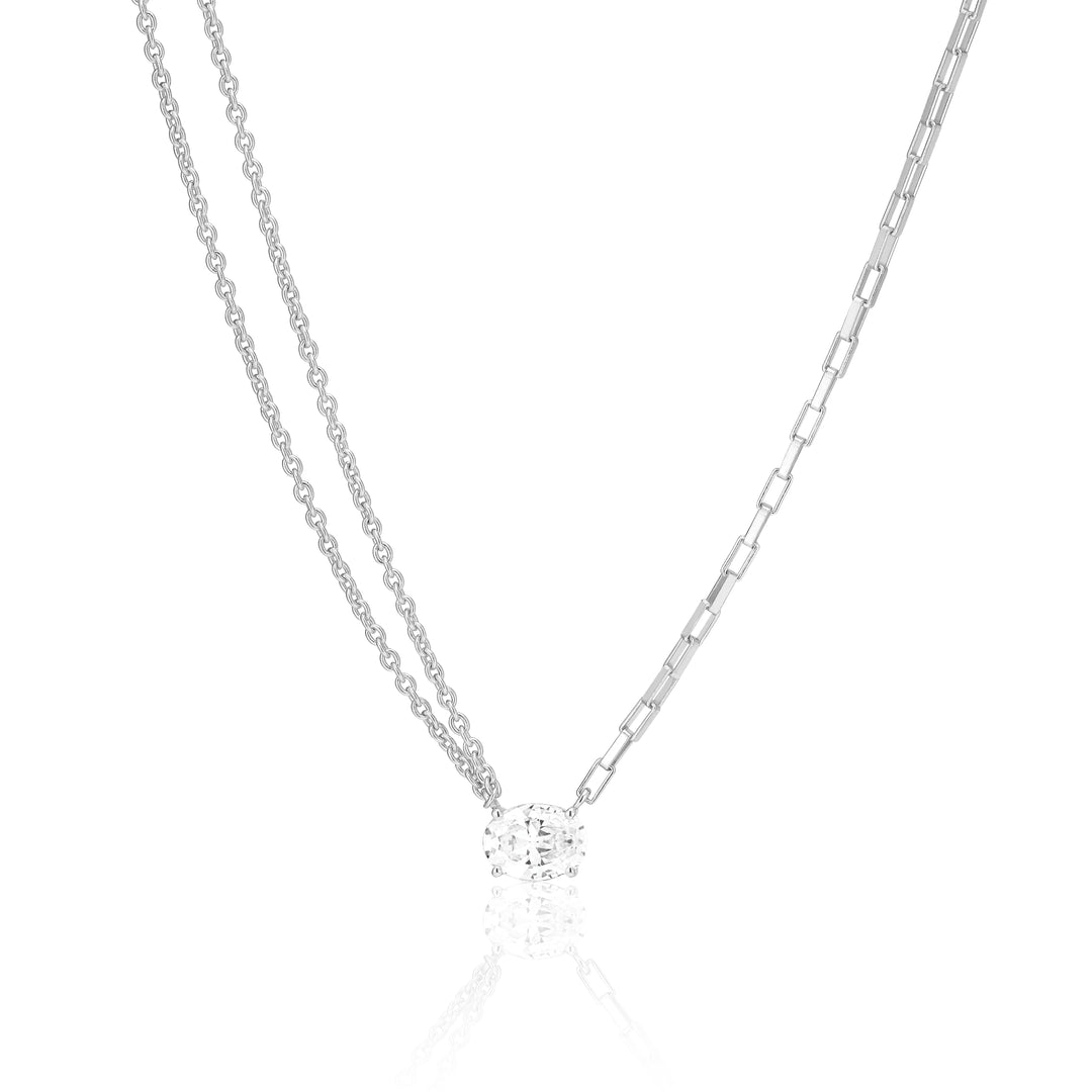 Necklace made of 925 Sterling Silver with rhodium, polished surface, and handset with facet cut white zirconia.